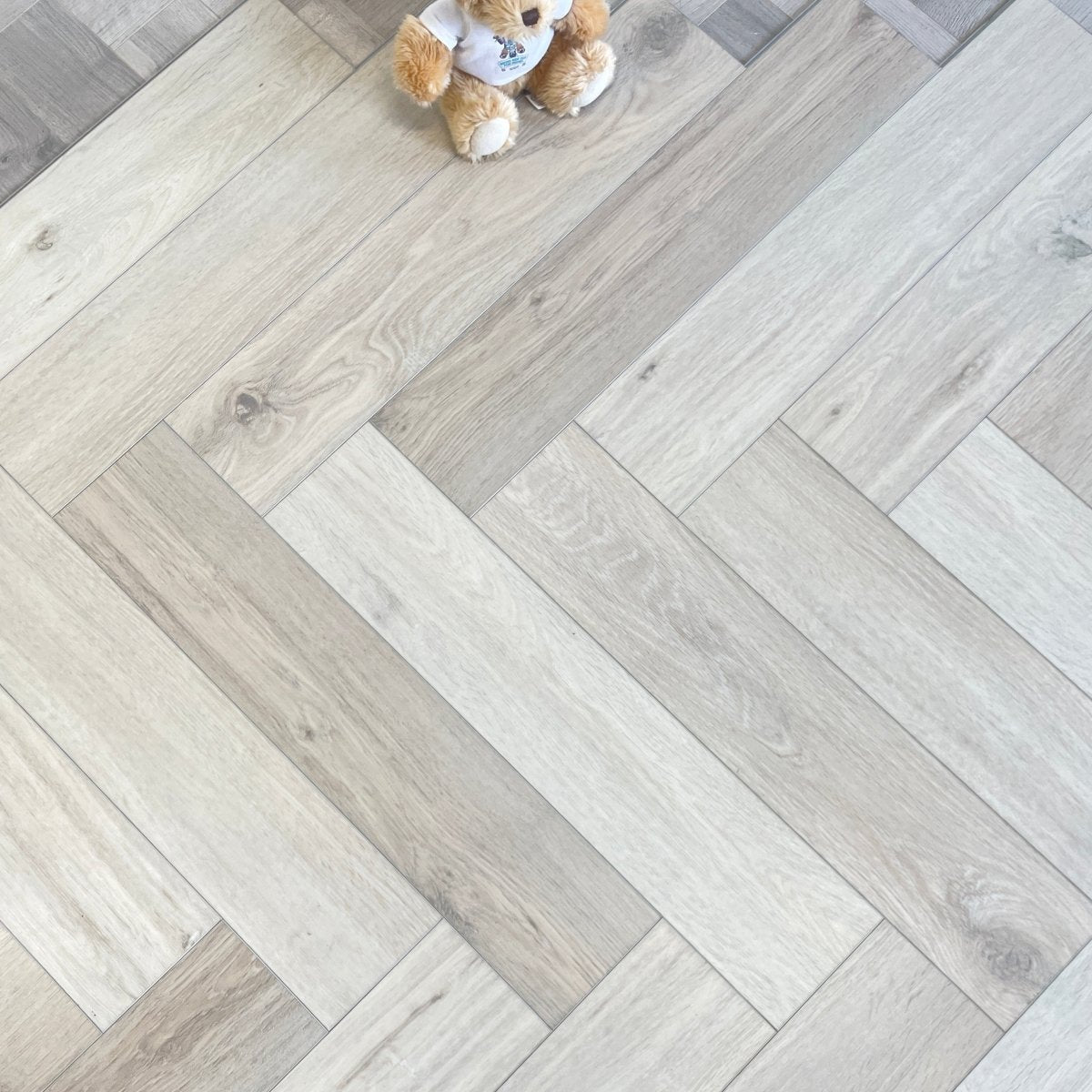 Karna Bordeaux Oak Herringbone SPC - Wood Floor Store