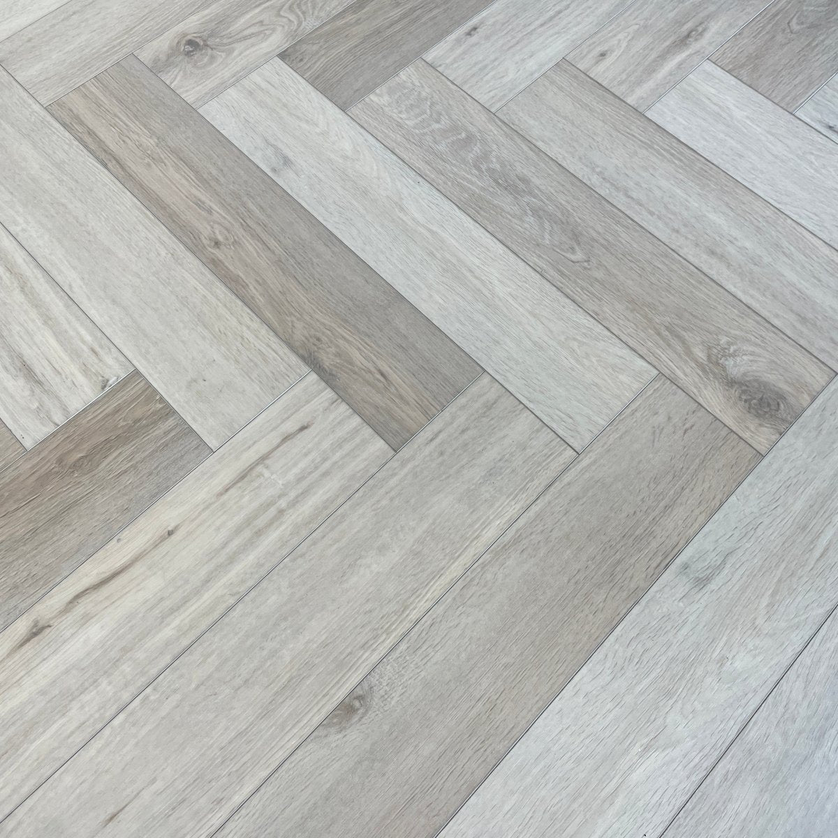 Karna Bordeaux Oak Herringbone SPC - Wood Floor Store