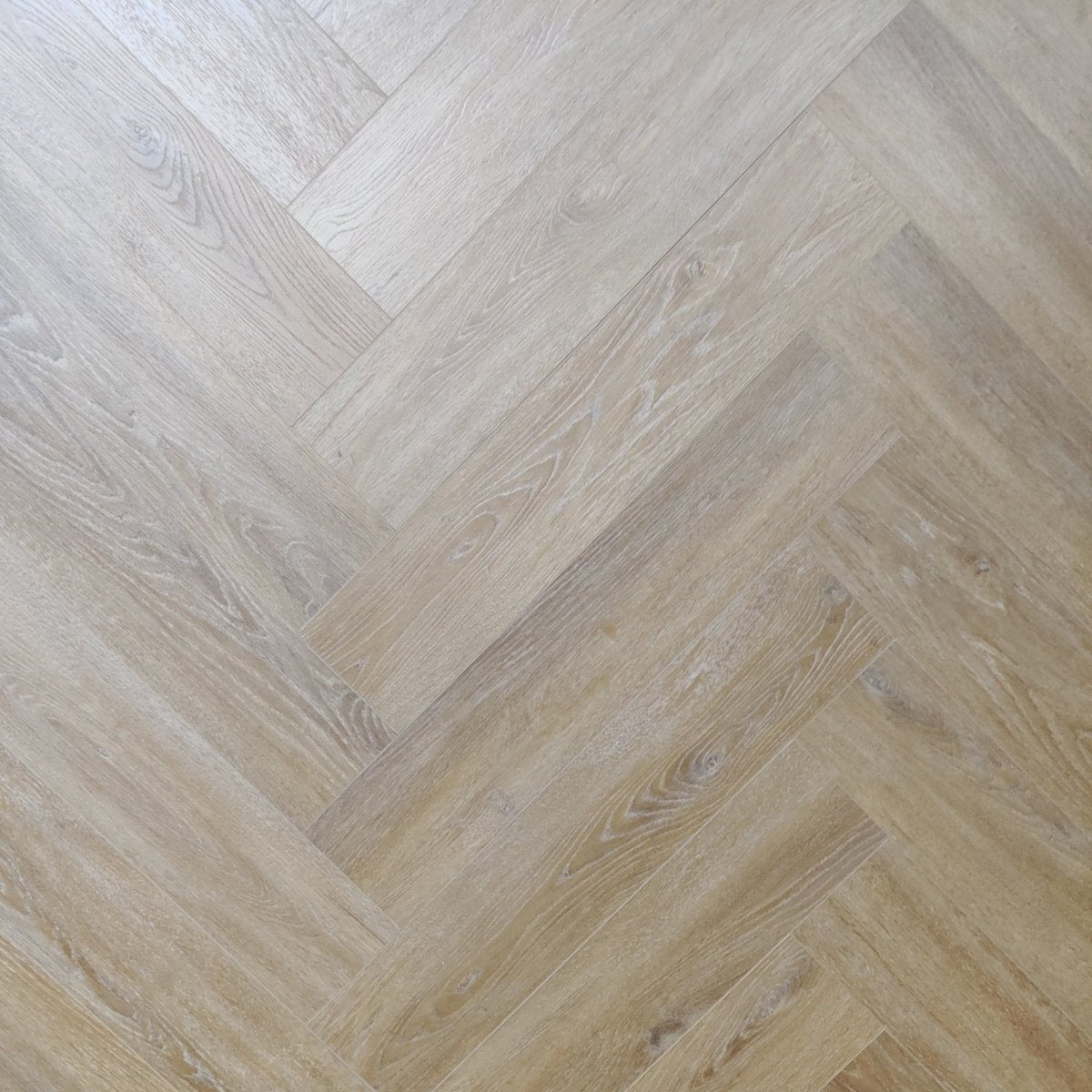 Karna Royal Oak Herringbone SPC - Wood Floor Store