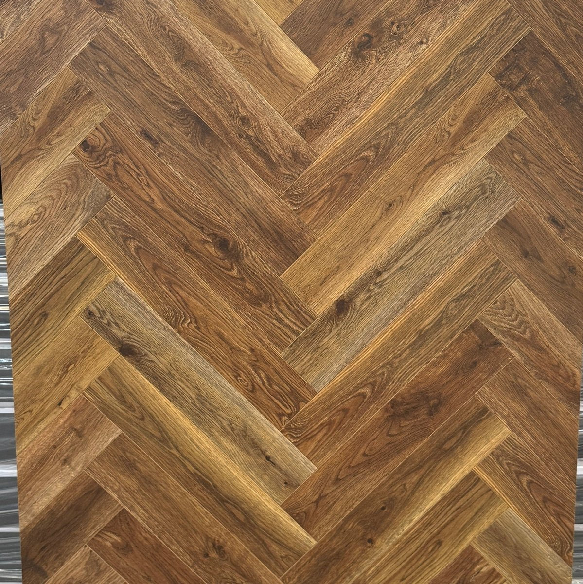 Sample of Lightly Smoked Oak Herringbone - Wood Floor Store